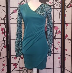 Teal dress with lace flower pattern sleeves